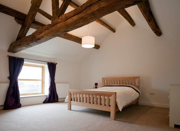 Bedroom showing feature oak beams. Bedroom showing feature oak beams.